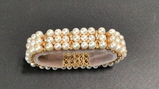 14K Gold and Pearl Bracelet: 7.5 inch bracelet, 3 rows pearls with flexible links, each set with diamond ….stamped 14 k..also 585 and HN