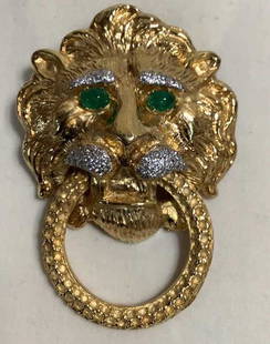 14k Lion Head Doorknocker Brooch: 3 inch pendant / brooch ..unmarked with emerald eyes, Diamond Whiskers and eyebrows…holds the circle used as a motif for majesty and courage…70.1 grams, appro 38 diamonds, estimated .75tcw