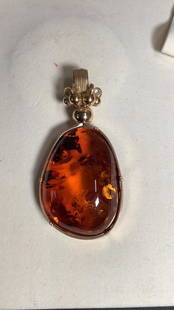 Amber Pendant in Gold Plated Wire Mount: 3.5 inch Baltic? Amber stone set in a gold? Multi strand wire mounting.. no marks