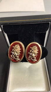 Pair 14K Earrings: Oval clips in gold ..lion holding a shield with a Diamond at center, carnelian backing…marked 14 k and 585…