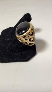 14 k Yellow Gold Onyx Ring: 1 Inch Oval Flat Black Onyx Mounted In 14 K Gold…pierced Shoulders, 12.5 grams