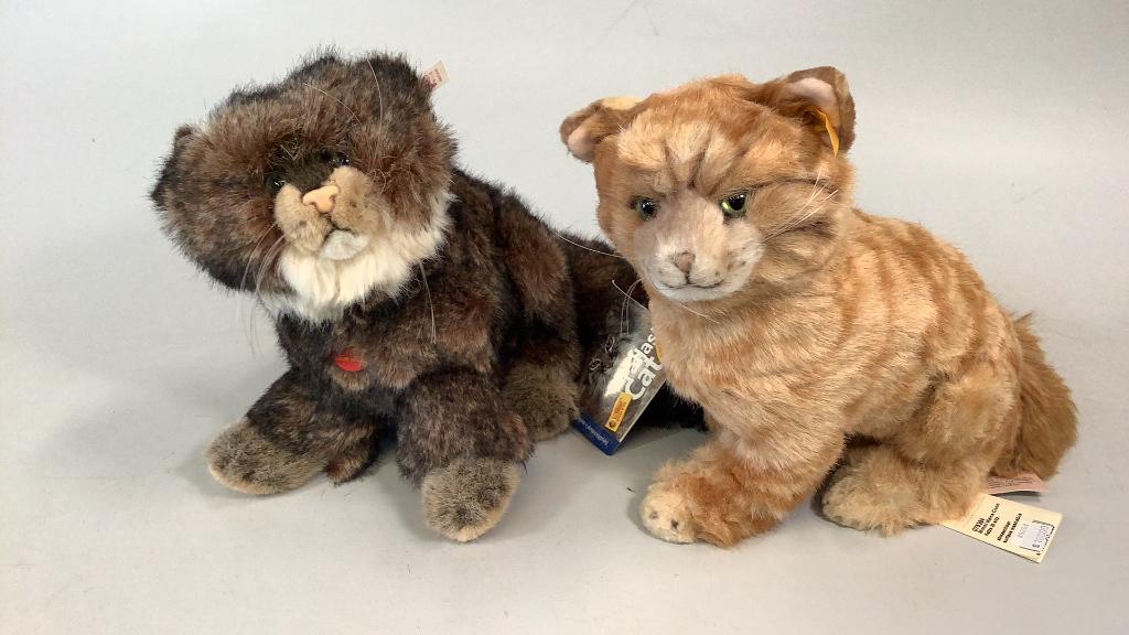 2 Steiff Cats: Mimi Maine Coon yellow tag w/ button and chest tag..10 x 14 inches…Smithsonian Pallas Cat, 11 inches tall, with white ear tag, chest tag, original purchase tag..both clean ..Sweet!!
