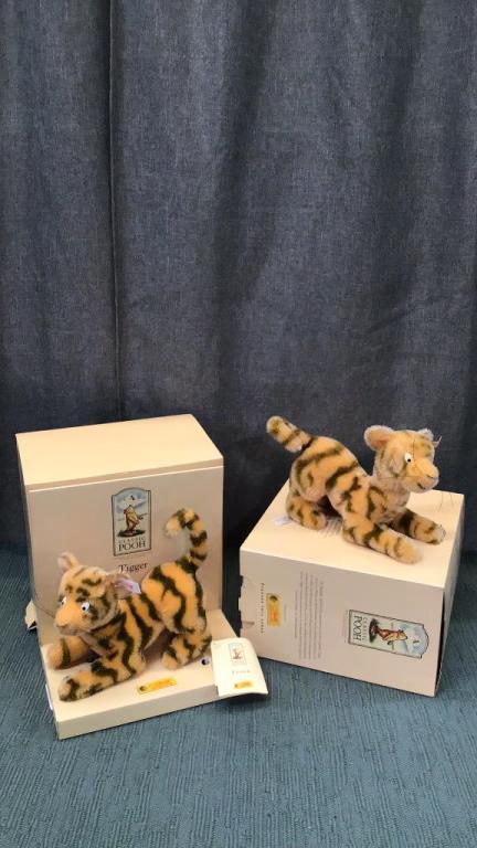 2 Classic Pooh ‘Tigger’ Animals by Steiff: Both are 7 inch..mohair..2000 limited edition #430/5000 and#556/5000.. #556 has lighter coloration..button and tags in both ears with attached tags on legs..both have been displayed but in good condit