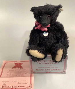 Steiff Replica Bear, 1912: Produced in 1992, limited edition #526/7,000. Black distressed mohair, with certificate, ear button and ribbon…chest tag…w/ original box..has been displayed, but good condition