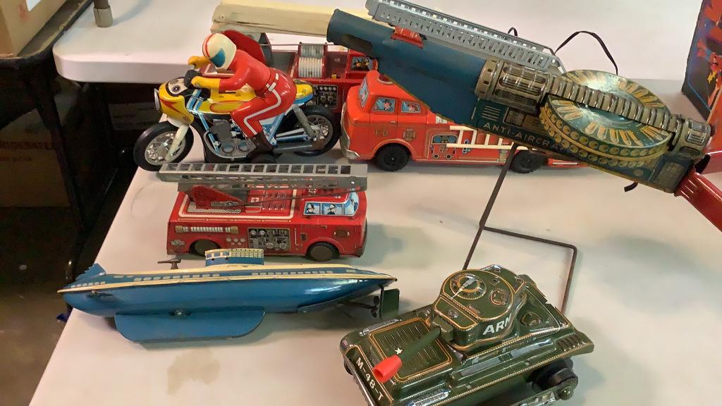 7 Tin Toys: Battery and Friction Drive…Wolverine submarine, Marx Anti Aircraft Gun, Firetrucks, Motorcycle
