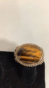 Angelique de Paris Ring: Oval facet cut tigers eye quartz, set in 925 mount,