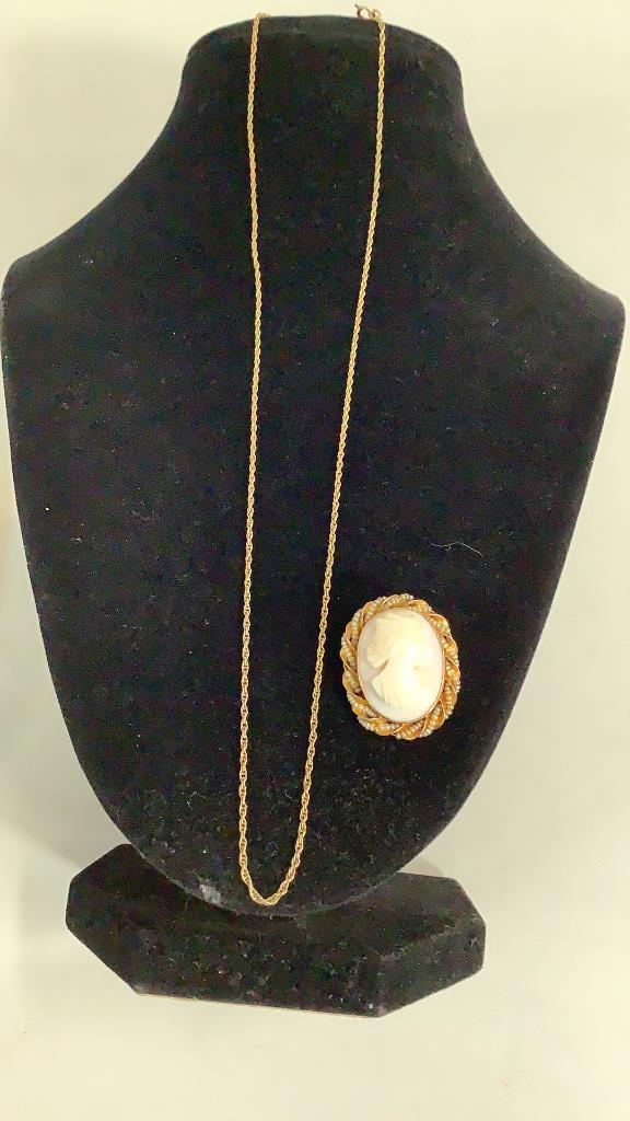 Victorian Cameo With Chain: 1 Inch Carved Cameo Mounted In A Ornate Gold Mount, Tiny Seed Pearls Surround The Mount..with A Chain* Not Tested
