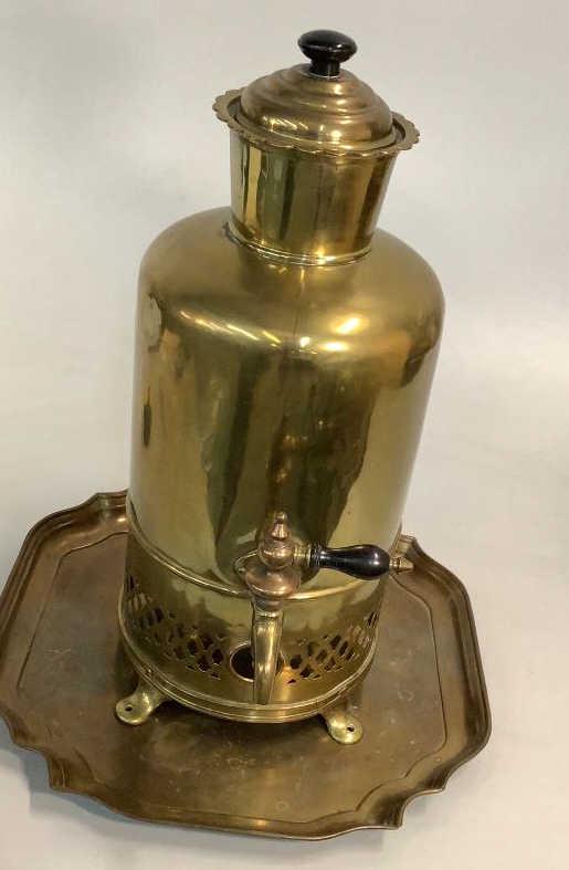 Brass Samovar With Tray: 21 inch tall round Samovar, pierced skirt, wooden handle and knob footed paired with a 17 inch square tray..no marks Line Item # 23