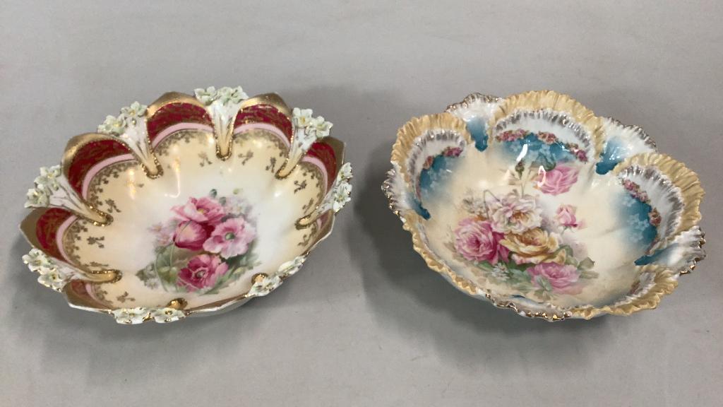 2 RS Prussia Porcelain Bowls: 10 inch handkerchief lace bowl in cream and blue ..center bouquet of roses, lowlight gilt rim, 10 inch impressive bowl with poppies in an ivory ground, alternating floral embossed rim , gilt banding, 
