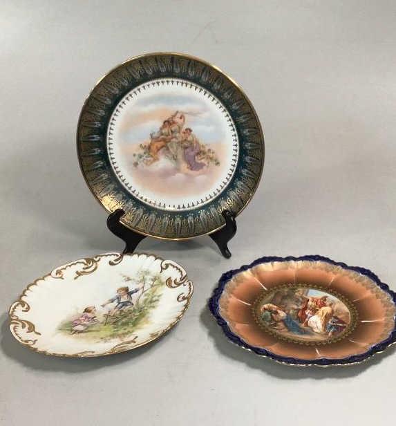 3 Pictorial Cabinet Plates: 2 Artist Signed .10 inch ornate hand pained plate depicting 3 Women in a romantic setting, heavy green and gilt border signed Carl Larson?? 8.5 inch plate with 2 children picking fruit, signed M.Vance