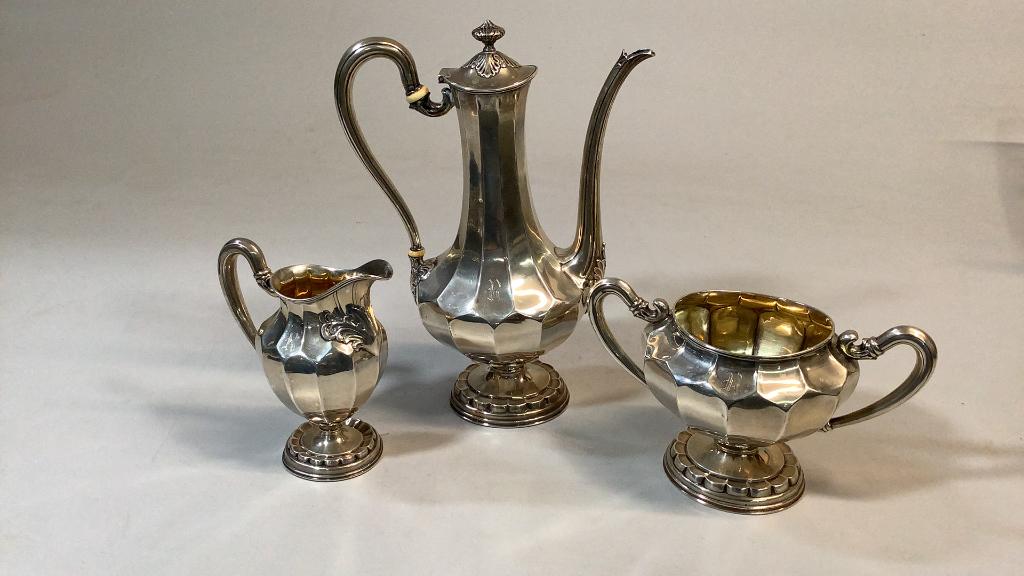 Towle Sterling Tea Service: 3 Pieces coffee server, open sugar, creamer .all in a matched pattern on stepped base acanthus leaves and foliate.. Line Item # 49