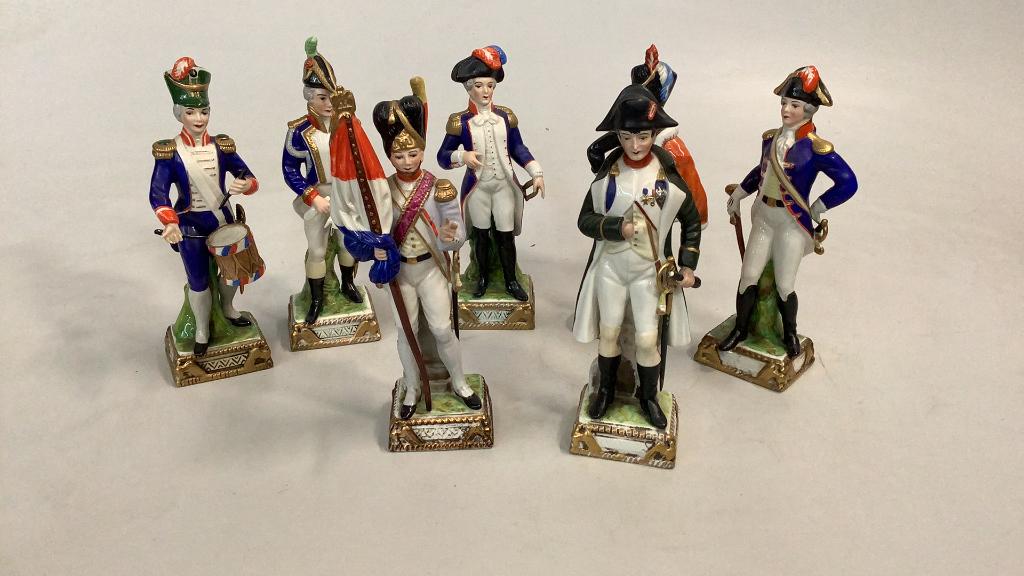 7 German Porcelain Military Figures: Napoleon and similar Figures …all 9: inches 2 with markers for Dresden ( Napoleon and Standard bearer)…5 others with 5 point crown and N marks..Pottschapel or Uffrecht ? * fingers damaged 