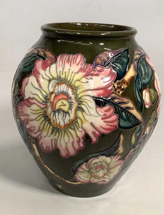 Moorcroft Gustavia Augusta Vase: 8 inch bulbous form designed by D. Hancock, date 1999, with impressed and stamped marks for Moorcroft Design Studio…great bright florals on a green body..* minor crazing to base Line Item # 51