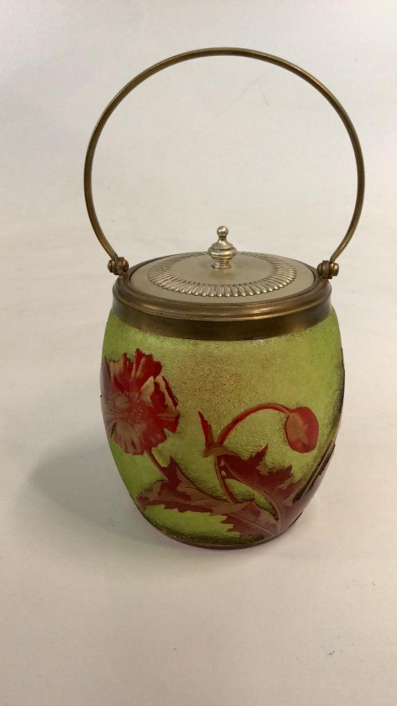 French Acid Etched Cameo Biscuit Jar: Beautiful olive green glass with a red etched floral design, 6 inches to lid, plated top with a bail handle…Unsigned but In style of Baccarat Line Item # 93
