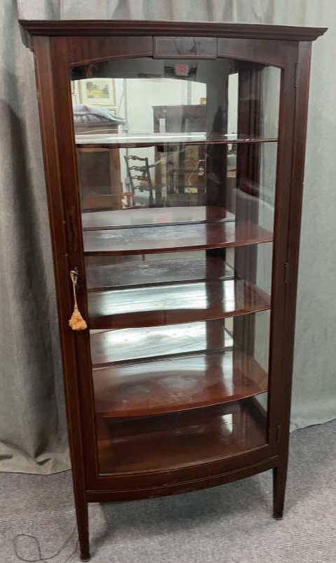 Bow Front Mahogany Curio Cabinet: inlay, mirrored back, puck lights under shelf, minor losses..66 tall x 30 wide x 17.5 deep
