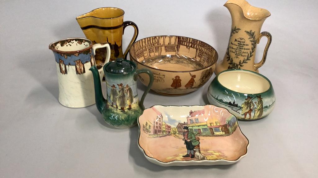 7 Pieces Royal Doulton: 10 inch diameter Night Watchman Bowl, Moonrakers Bowl, Teapot…6 inch pitcher with owls, 9 inch ale pitcher with verse…8 inch pinch spout ale pitcher, landscape…Dickensware 9 inch pla
