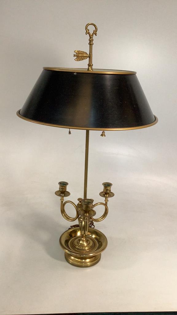 Brass Bouillotte Style Lamp, Warren Kessler: New York designed lamp, 29 inches tall, features three candle arms, tall upper post with feather and ring finial, black tole style metal shade, designers tag to post