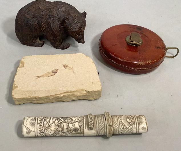 Oddities Collection: Whalebone carved dagger, 6 inch Carved Black Bear, John Rabone leather cased retractable measure, 66 feet, Fish Fossil 6 inches