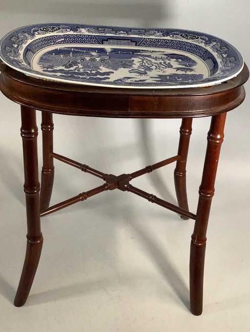 Asian Tray Table: 18 inch Blue Willow platter, rests on a 22 inch oval frame with cross stretcher base
