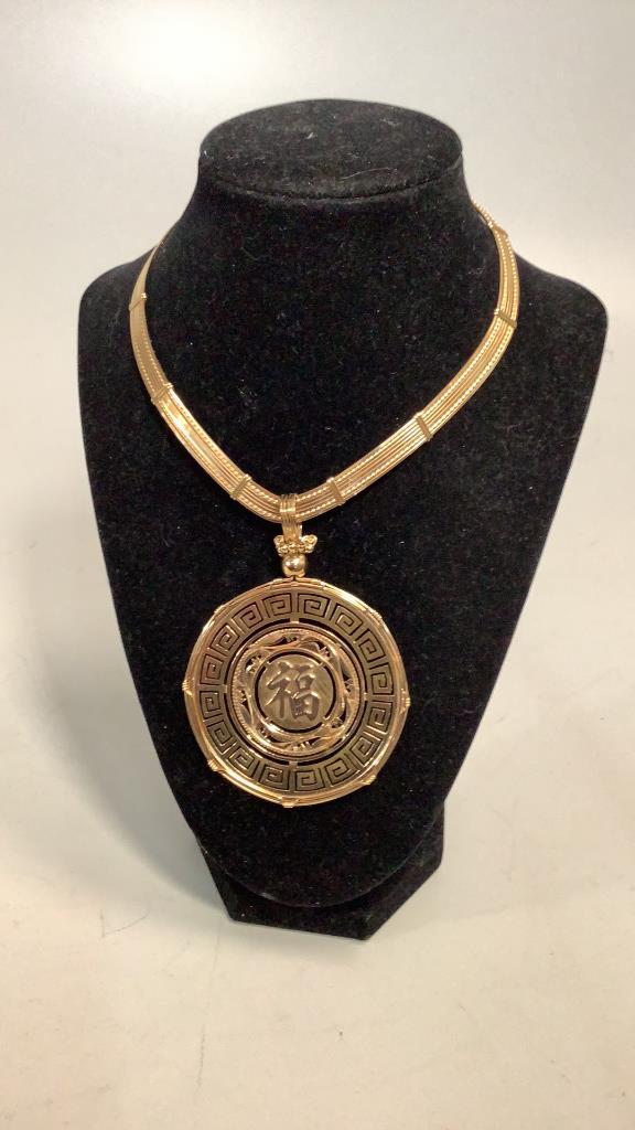 Gold ToneNecklace and Chinese Medallion: Multi Strand choker with a Chinese character medallion , marked as 14 k but tested NOT Gold