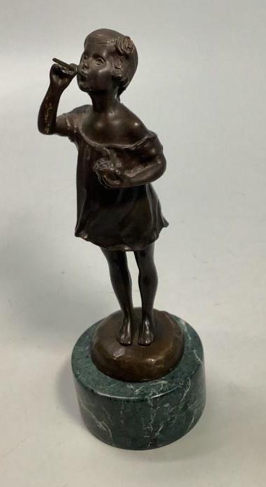 Bronze Sculpture Girl Blowing Bubbles: After Suzanne Bizard, 10 3/4 inches tall, shows young girl blowing bubbles thru a straw, mounted on a cylindrical green base, good condition