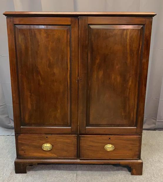 Edwardian English Mahongay Gentleman’s Press: LIine Item # 59 Banded and dovetailed drawers, bracket feet, missing 2 shelves, 57H x 47W x 23D