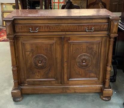 Marble Top Belgian Oak Server: Carved door panels, interior drawers, front left foot and column need repair, 41H x 47W x 21D