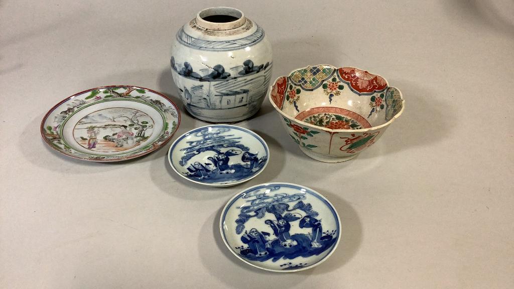 5 Pieces Asian Pottery and Porcelain: 8 inch porcelain plate, animals and tree borders, 2 4 inch blue and white plates, 6 inch Ginger Jar ( no lid) lotus petal bowl with green seal mark