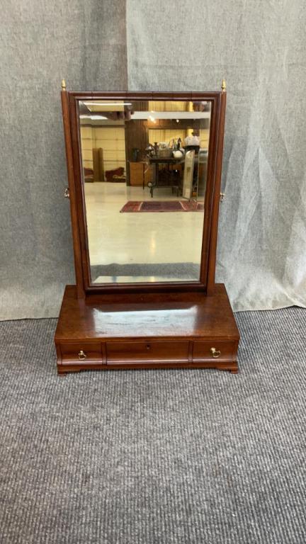 19th Century Mahogany Shaving Mirror: Ogee bracket feet, shaped dovetailed drawers, brass finials, 24 tall x 18 wide x 9 deep