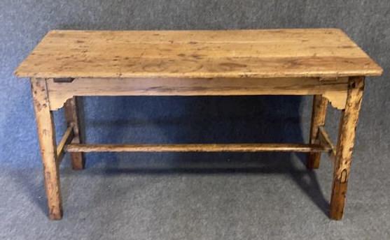 English White Pine Trestle Table: Pegged construction , scalloped skirt, all four feet have been tipped, evidence of restoration 30 tall x 58 long x 26 deep