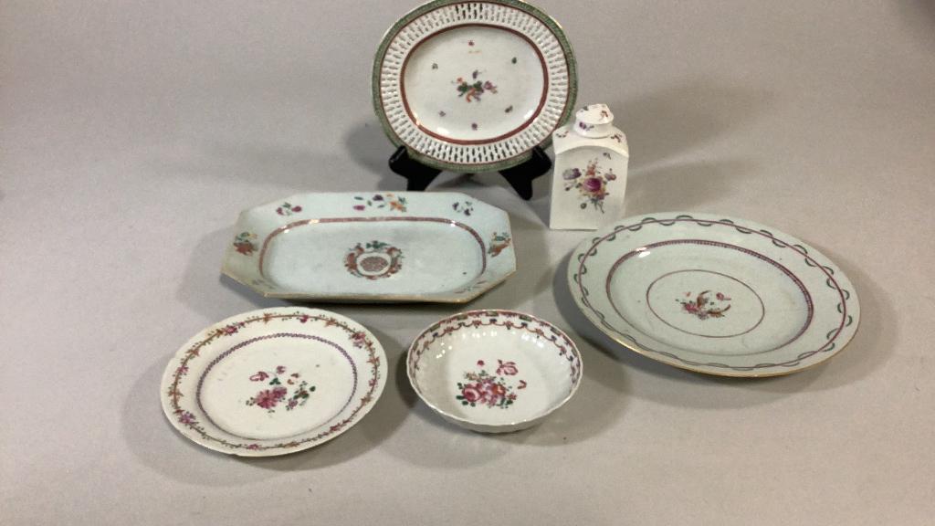 6 Pieces Asian Export Porcelain: 10 inch Armorial porcelain tray, center crest with winged bird, 8 inch oval platter with reticulated rim, floral design to center, table bottle, 6.5 inch saucer, 5 inch saucer, 9 inch plate ( repaired