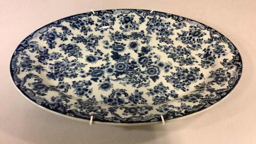 Oversized Chinese Export Platter: 23 x 16 inches, repeating pattern of florals, foliage in cobalt blue on a white ground, center urn , excellent condition, back stamp with blue character marks,