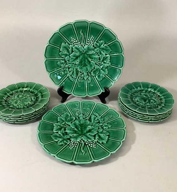 French Majolica Sarreguemines Dessert Set: 12 pieces, two 11 inch master plates, 10 plates @ 7.5 inches, grape leaf and clusters on green, good condition