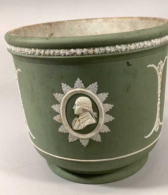 Wedgwood Profile Planter: 9 x 10 inch planter bearing the profile of George Washington , Ben Franklin , and Lafayette, in traditional green matte with ivory cameos, and rosettes, interior staining from normal use