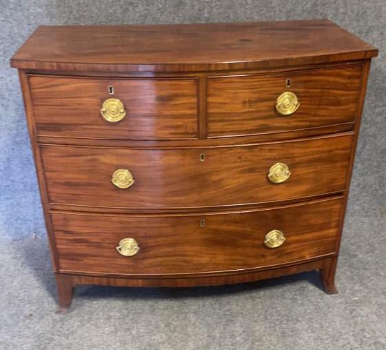 English Hepplewhite Mahogany Chest: Banded and dovetailed Split drawers over two lower drawers, French foot, newer pulls, newer back. 34 tall x 40 wide x 23 deep
