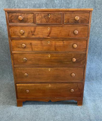 North Carolina Walnut Federal Chest: Yellow pine secondary, dovetailed bracket feet, inlaid key escutcheons, banded and dovetailed drawers, 58 tall x 43 wide x 23 deep made by replaced knobs, Franklin D Rhindhardt