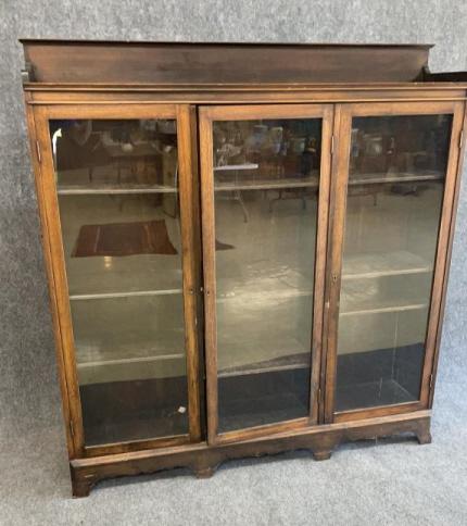 3 Door Bookcase: Scalloped skirt, adjustable shelves, Mahogany 63 tall x 60 wide x 13.5