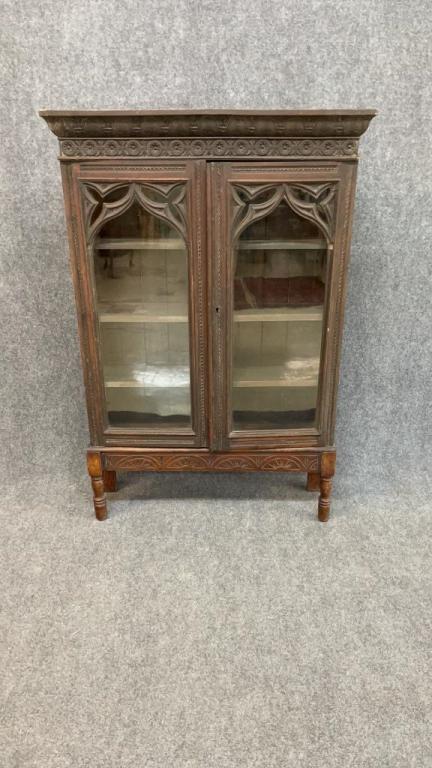 Highly Oak Carved Gothic Revival Bookcase: Original glass, 4 interior shelves, Proper marriage to base, original finish 61.5 tall x 41 wide x 11 deep