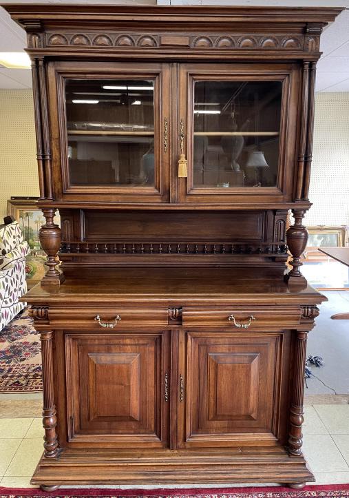 Belgian walnut Court Cupboard: Spindle plate shelf, carved cornice, reeded columns, paneled doors, 2 shaped dovetailed drawers 88.5 tall x 23 deep x 55 wide