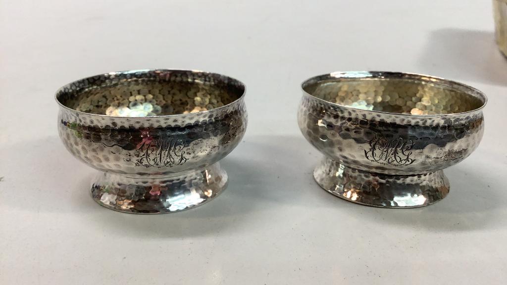 Pair Tiffany and Company Sterling Salt Cellers: Hammered design, 2.5 inch circumference, engraved at shoulder , stamped Tiffany and Company Sterling Silver