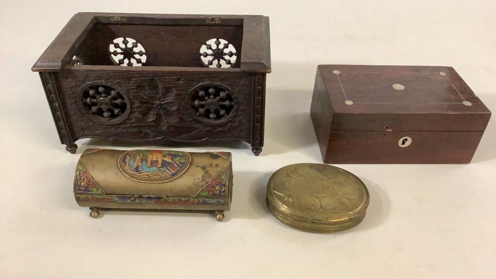 Trinket and Table Boxes: Asian 6 inch brass cylinder style box with enameled corners and end caps, stamped China, 4 inch oval brass box, with 7 etched portraits to lid, reverse with similar Cities, 7 x 3 inch hinged box, moth