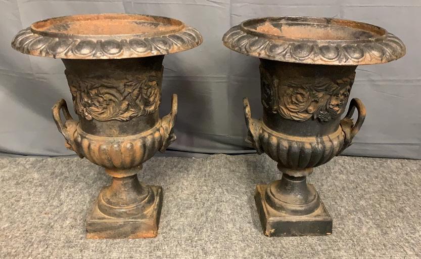 Pair of Campagna Form Cast Iron Entry Urns: 20th century, campagna form with egg and dart design on rim, fair to goods condition with paint loss and rust throughout, 25 inches tall Line Item # 185