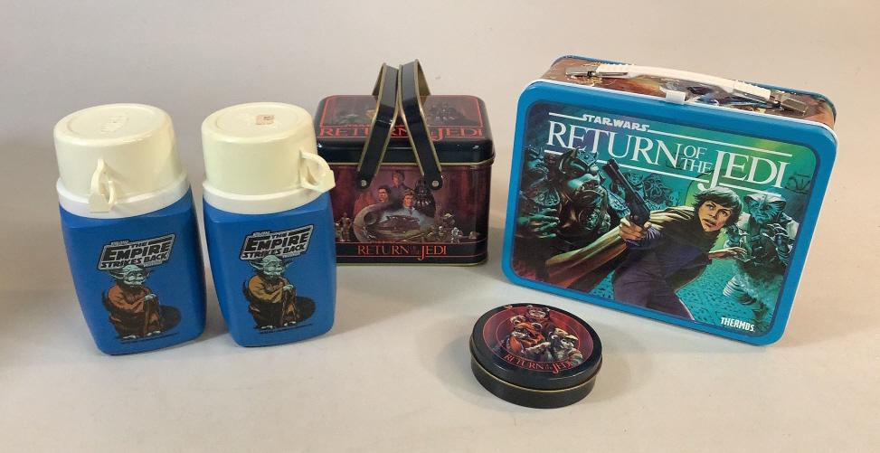 Star Wars Lunch Box, Thermos, Tins: 1983 Vintage Return of Jedi Metal lunch box w/thermos NOS, 2- Empire Strikes Back plastic Thermos bottles, w/ lids and cups, 5 x 6 inch double handle tin Lithograph box, ROTJ graphics, 4 inch round ti