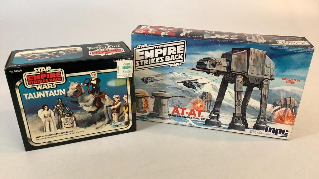 Empire Strikes Back Tauntaun and At-At Transport: 1977 Kenner Tauntaun mammal with saddle and reins NOS, sealed by tape, 1981 AT-AT transport model ( not sealed) cannot verify all pieces present