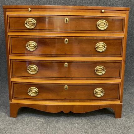 Satin Wood Bow Front Bachelor’s chest: Satin wood bow front bachelors chest by Hickory Chair. Pull out writing surface. Chest measures 32.5 inches tall x 34 inches wide x 19 inches deep
