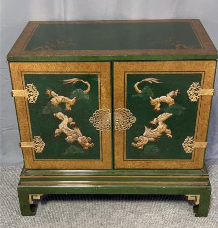Lacquered Asian Cabinet: Lung dragon painted on doors, brass hardware, excellent quality, interior shelf need supports 29.5 tall x 31.5 wide x 19.5 deep