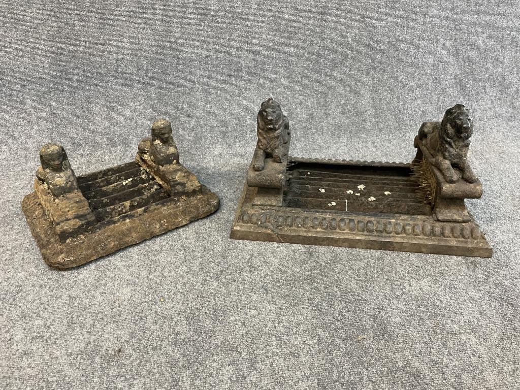 2 Figural Cast Iron Book Scrapes: 1 with Sphinx 8 tall x 13 deep x 15 wide , 1 with recumbent lions 11 tall x 21 wide x 13-3/4 deep, illegible signature.