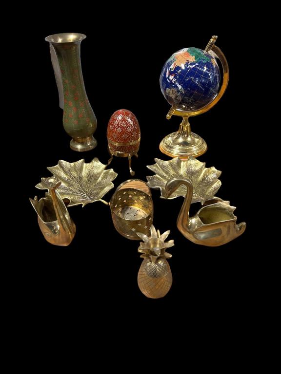 Brass Decorative Items: Pair leaf shaped trays stamped NC, 2 brass swans, small lidded pineapple box, table basket w/ handle, enameled egg box on stand, enameled Asian style vase, Lapis blue table top globe on brass stand 12