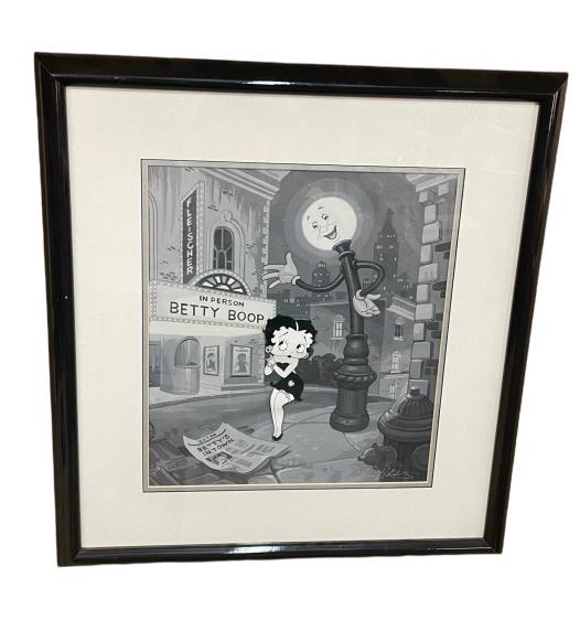 Limited Edition Betty Boop Hand Painted Cel: Titled NOW SHOWING, published by APG Publishing Inc, 1991. Hand painted cel on serigraph background. Signed by Shamus Culhane and Tim Hildebrand, edition 87/200. Good condition. Sight 16.5H x 14.5W
