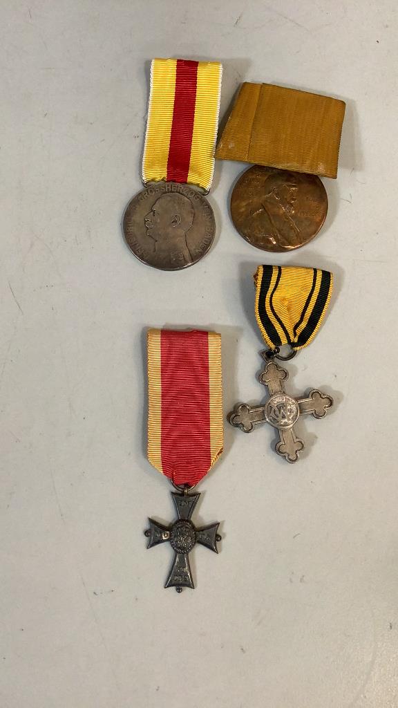 4 Military Medals: Kaiser Wilhelm I Centennial Medal, profile on gold tone disc, with ribbon, Baden Silver Medal of Merit, profile Frederick II, Charlottes Cross of Merit, ( war related care of the wounded), sterling cr